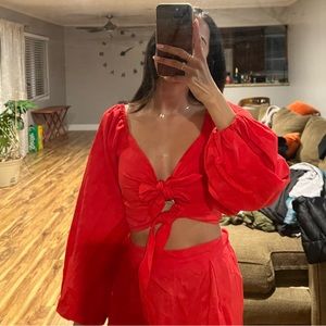 Charlie Holiday red tie top.